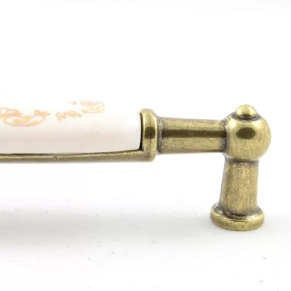 Ручка-скоба 96 мм, материал цамак, цвет бронза состаренная + керамика  с золотым рисунком, арт. UP21-0096-G00AB-MLK3 стоимость 770 руб.